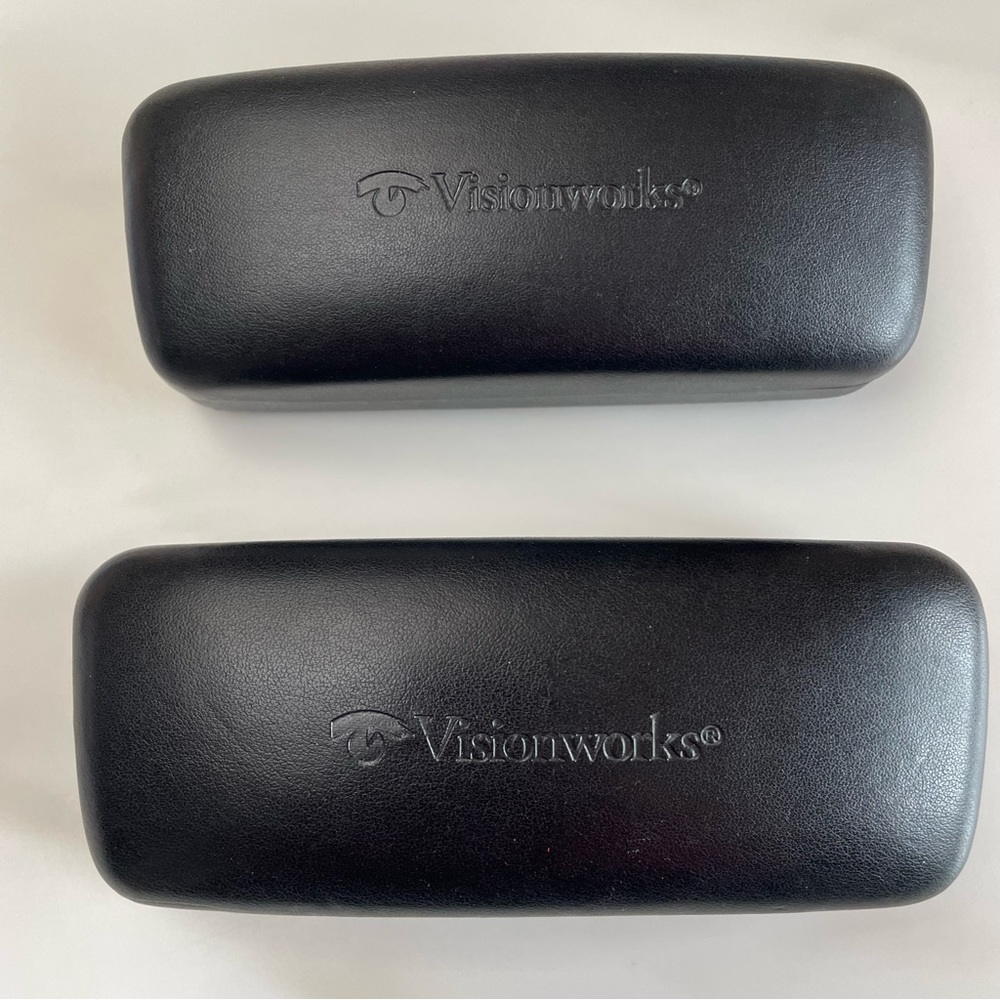 Pair of Visionworks hard shell glasses cases